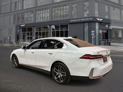 2026 BMW 5 Series — rear three-quarter view
