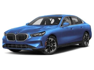 2027 BMW 5 Series 530i in Phytonic Blue Metallic — front three-quarter view
