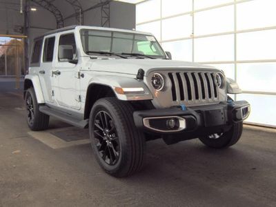 2023 Jeep Wrangler Sahara 4xe in Silver — front three-quarter view