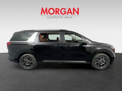 2026 Kia Carnival Hybrid — side profile view