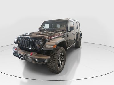 2024 Jeep Wrangler — rear three-quarter view