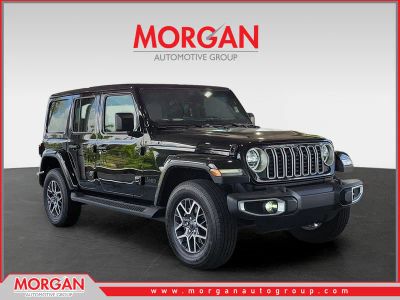 2026 Jeep Wrangler Sahara in Black Clearcoat — front three-quarter view