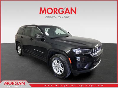 2025 Jeep Grand Cherokee Laredo in Black — front three-quarter view