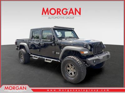2021 Jeep Gladiator Sport in Black — front three-quarter view