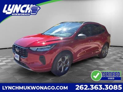 2024 Ford Escape ST-Line in Rapid Red Metallic Tinted Clearcoat — front three-quarter view