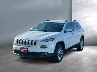 2015 Jeep Cherokee — front three-quarter view