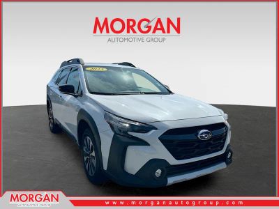 2023 Subaru Outback Limited in White — front three-quarter view