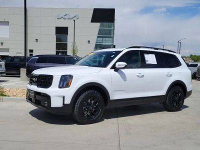 2024 Kia Telluride SX-Prestige X-Pro in Glacial White Pearl — front three-quarter view