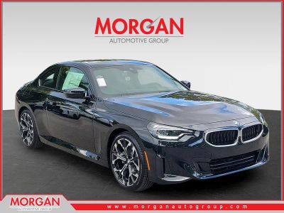 2026 BMW 2 Series 230i in Black Sapphire Metallic — front three-quarter view