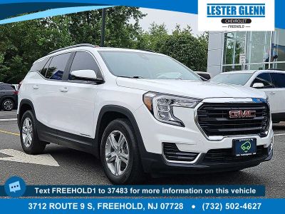 2023 GMC Terrain SLE in Summit White — front three-quarter view