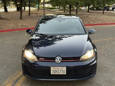 2016 Volkswagen Golf GTI — rear three-quarter view