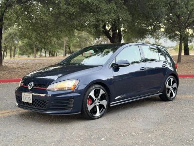 2016 Volkswagen Golf GTI in Blue — front three-quarter view