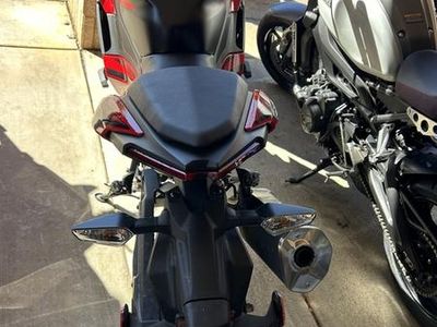 2025 Kawasaki Ninja 500 — rear three-quarter view