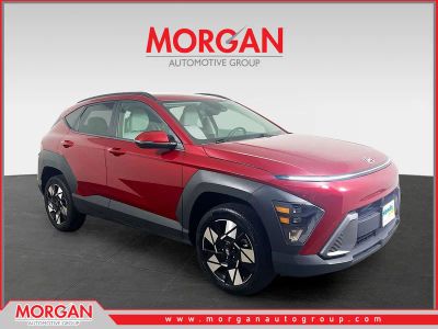 2025 Hyundai Kona SEL in Red — front three-quarter view
