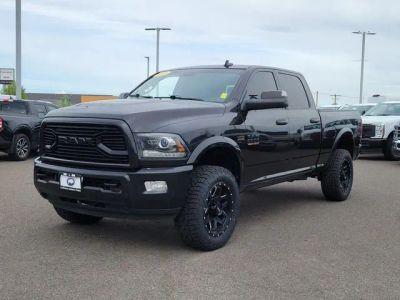 2018 RAM 2500 Laramie in Brilliant Black Crystal Pearlcoat — front three-quarter view