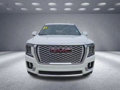 2021 GMC Yukon Denali in Summit White — front three-quarter view