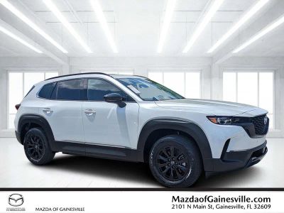 2026 Mazda CX-50 Hybrid Premium in Beige — front three-quarter view