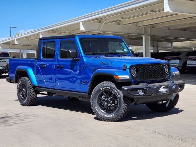 2026 Jeep Gladiator GLADIATOR WILLYS 4X4 in Hydro Blue Pearl-Coat Exterior Paint — front three-quarter view
