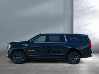2026 GMC Yukon XL — rear three-quarter view