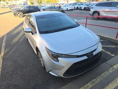 2021 Toyota Corolla LE in Classic Silver Metallic — front three-quarter view
