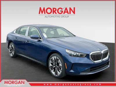2026 BMW 5 Series 530i in Blue — front three-quarter view