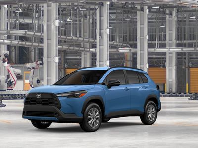 2026 Toyota Corolla Cross LE in Cavalry Blue — front three-quarter view