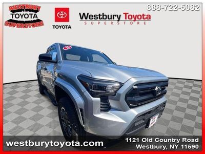 2026 Toyota Tacoma SR in Celestial Silver Metallic — front three-quarter view