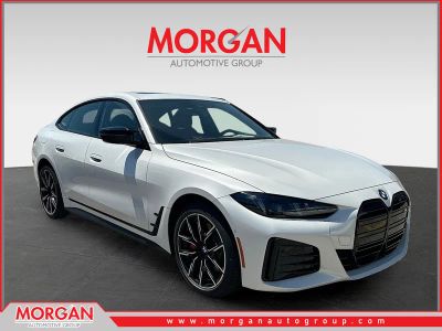 2026 BMW i4 M60 in Mineral White Metallic — front three-quarter view