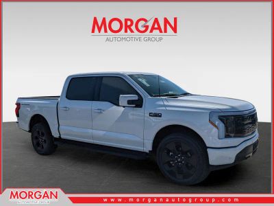 2025 Ford F-150 Lightning Platinum in White — front three-quarter view