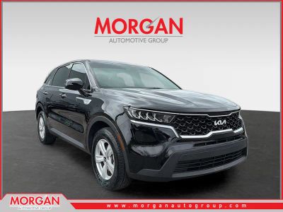 2023 Kia Sorento LX in Ebony Black — front three-quarter view