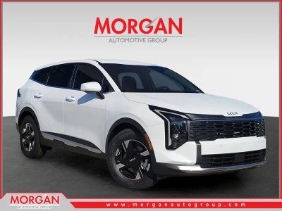 2026 Kia Sportage LX in Glacial White Pearl — front three-quarter view