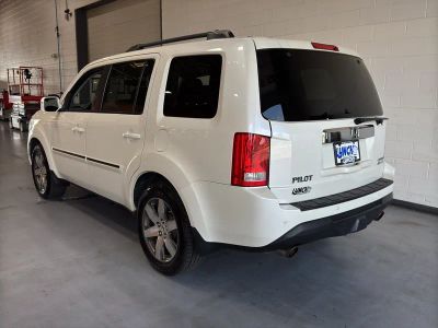 2015 Honda Pilot — rear three-quarter view