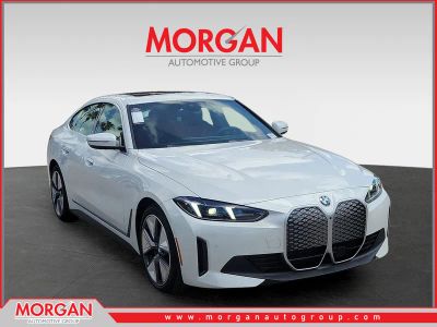 2026 BMW i4 xDrive40 in Mineral White Metallic — front three-quarter view
