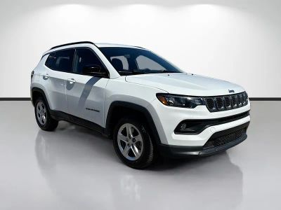 2023 Jeep Compass Latitude in White — front three-quarter view