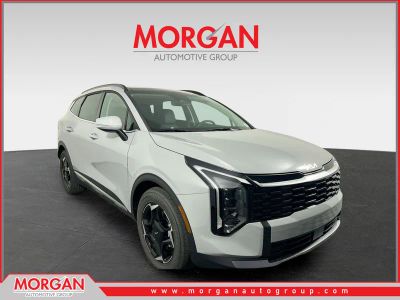 2026 Kia Sportage Hybrid EX in Wolf Gray — front three-quarter view