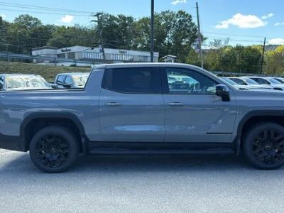 2026 GMC Sierra EV — rear three-quarter view