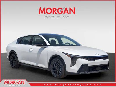 2025 Kia K4 GT-Line Turbo in Snow White Pearl — front three-quarter view