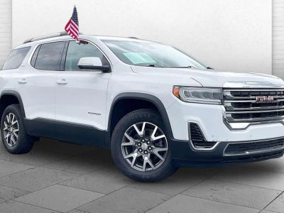 2023 GMC Acadia SLE in Summit White — front three-quarter view
