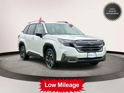 2025 Subaru Forester Limited Hybrid AWD in White — front three-quarter view
