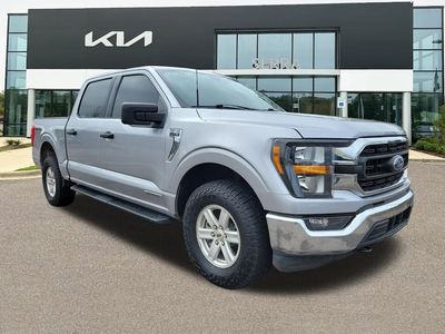 2023 Ford F-150 XLT in Iconic Silver — front three-quarter view