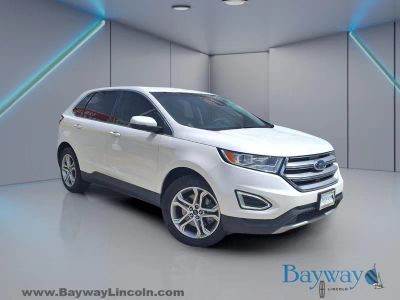 2018 Ford Edge Titanium in White Platinum Clearcoat Metallic — front three-quarter view