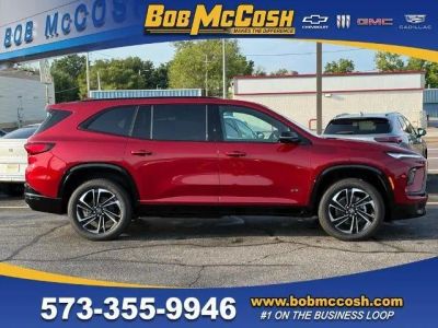 2026 Buick Enclave Sport Touring in Cherry Red Tintcoat — front three-quarter view