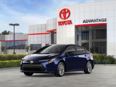 2026 Toyota Corolla LE in Blue — front three-quarter view