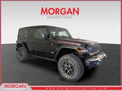 2026 Jeep Wrangler Rubicon in Black — front three-quarter view