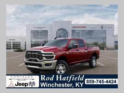 2026 RAM Ram 2500 RAM 2500 TRADESMAN CREW CAB 4X4 6'4' BOX in Molten Red Pearl-Coat Exterior Paint — front three-quarter view