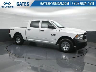 2016 RAM 1500 Tradesman in Bright White Clearcoat — front three-quarter view