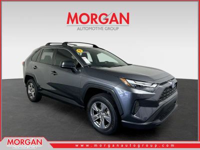 2024 Toyota RAV4 Hybrid LE in Magnetic Gray Metallic — front three-quarter view