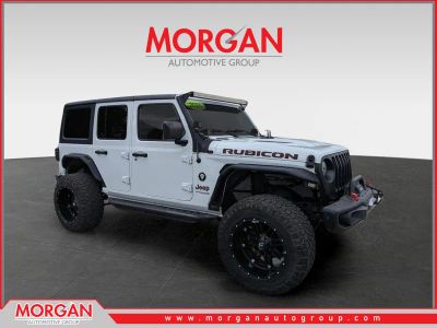 2020 Jeep Wrangler Unlimited Rubicon in Bright White Clearcoat — front three-quarter view