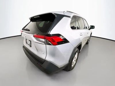 2025 Toyota RAV4 — rear three-quarter view
