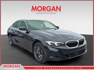 2025 BMW 3 Series 330i xDrive in Black — front three-quarter view